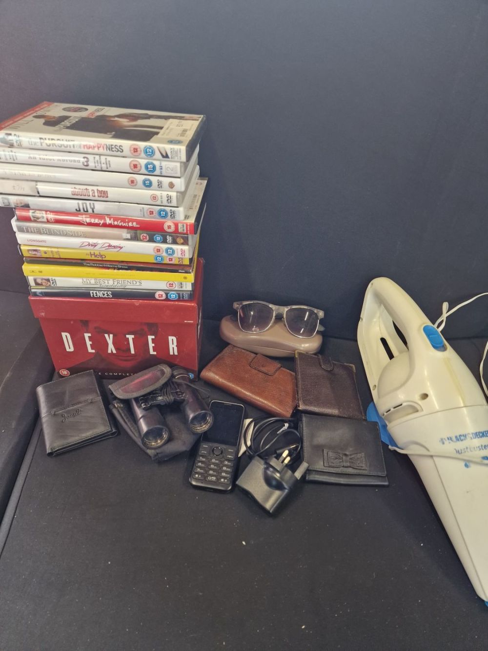 Lot 350: A mixed collection of DVDS, mobile phone, leather...