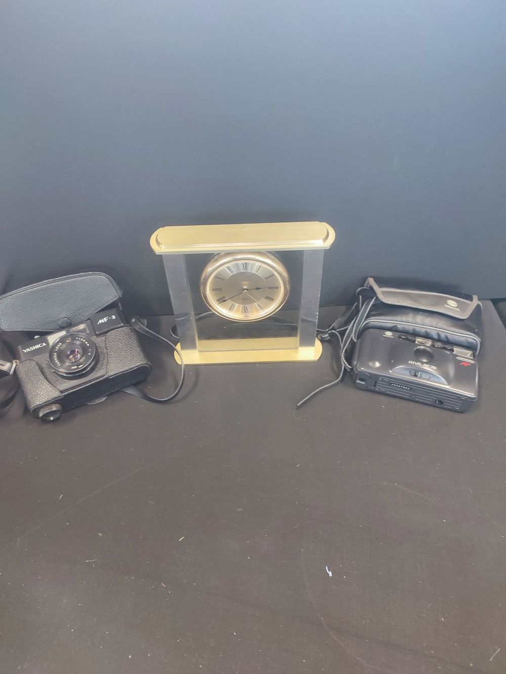 Lot 361: Yashica MF-2 and Minolta Riva AF35 cameras along...