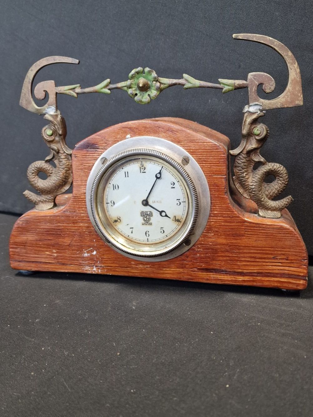 Lot 370: Two unique design brass and wood SMITHS Mantel...