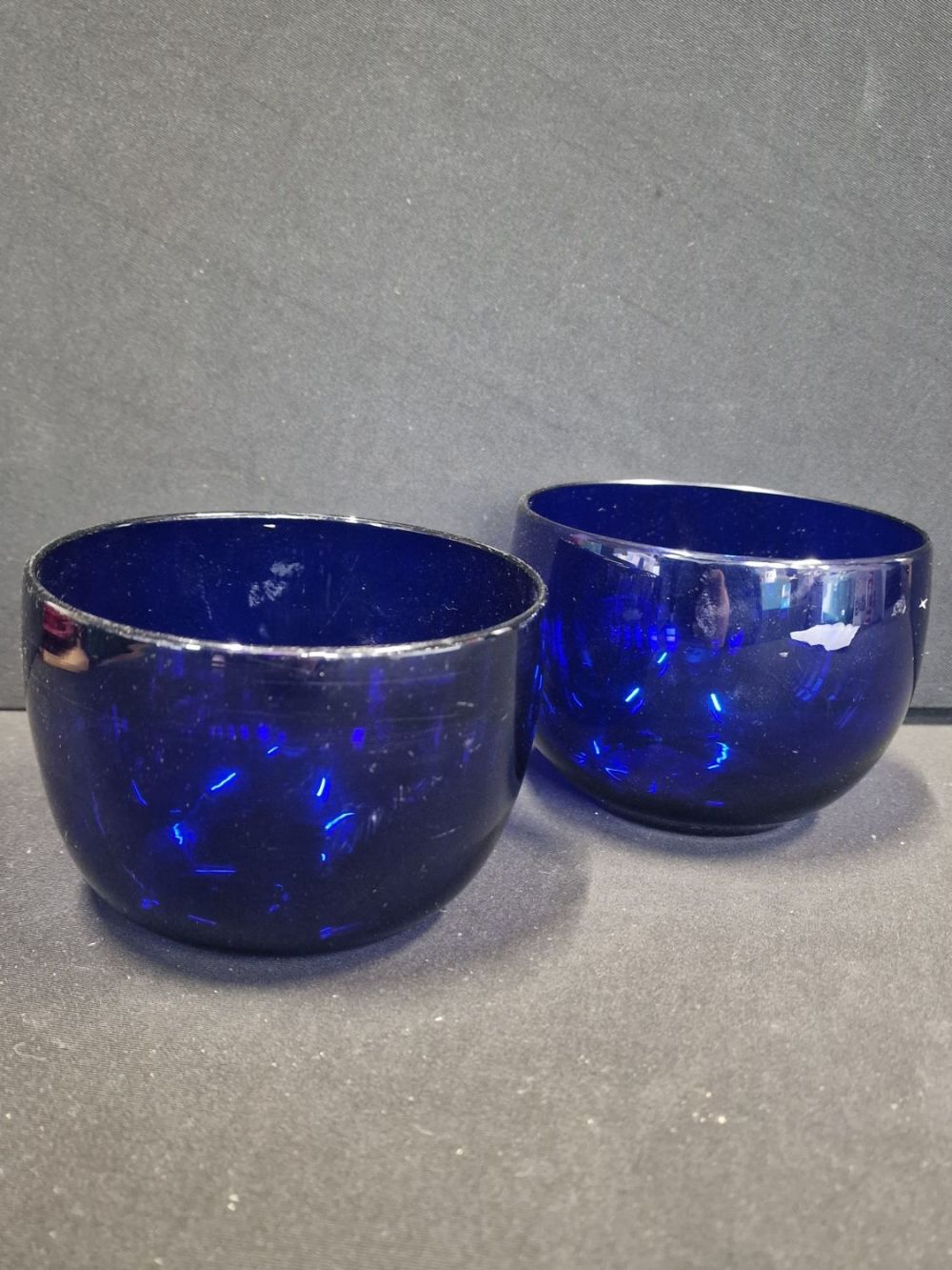 Lot 380: Two antique Georgian Bristol Blue glass finger bowls