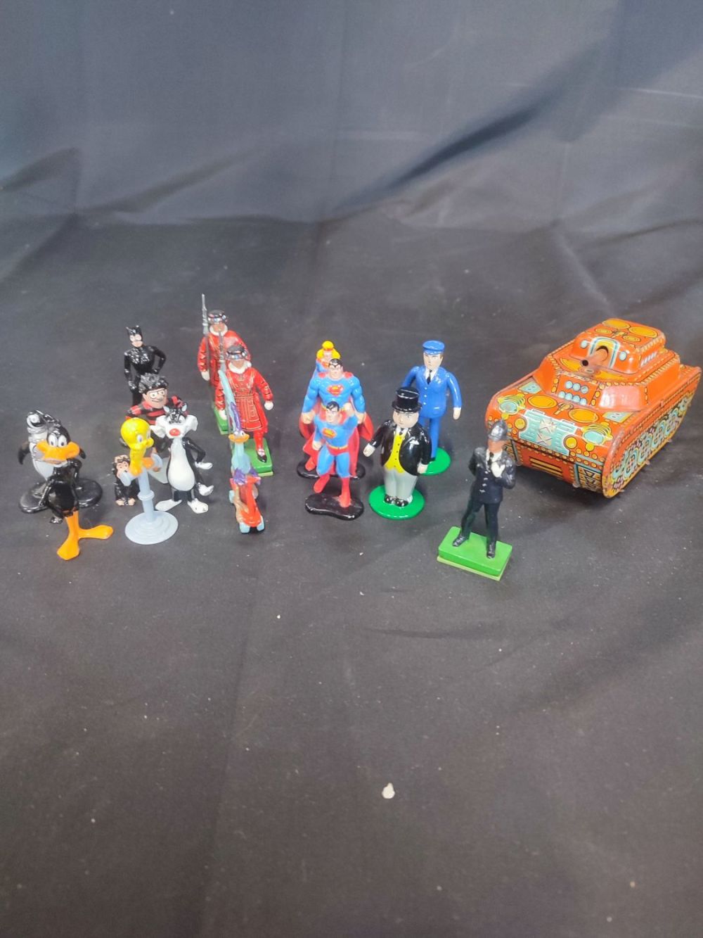 Lot 381: Vintage tin plate tank along with a collection...