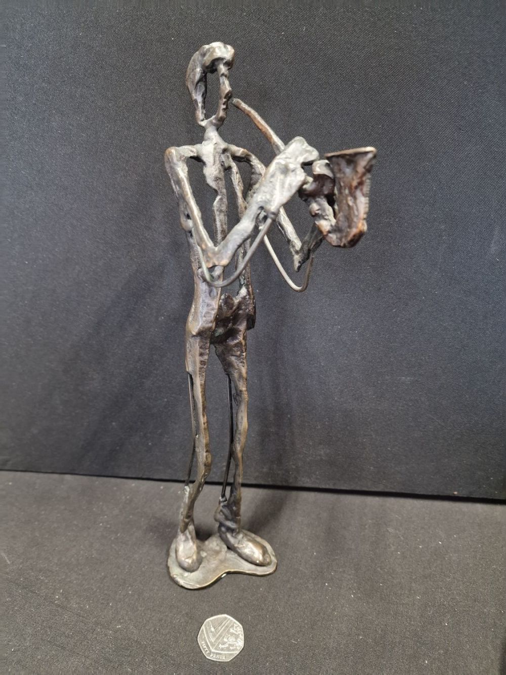 Lot 382: Bronze Saxophone player figurine