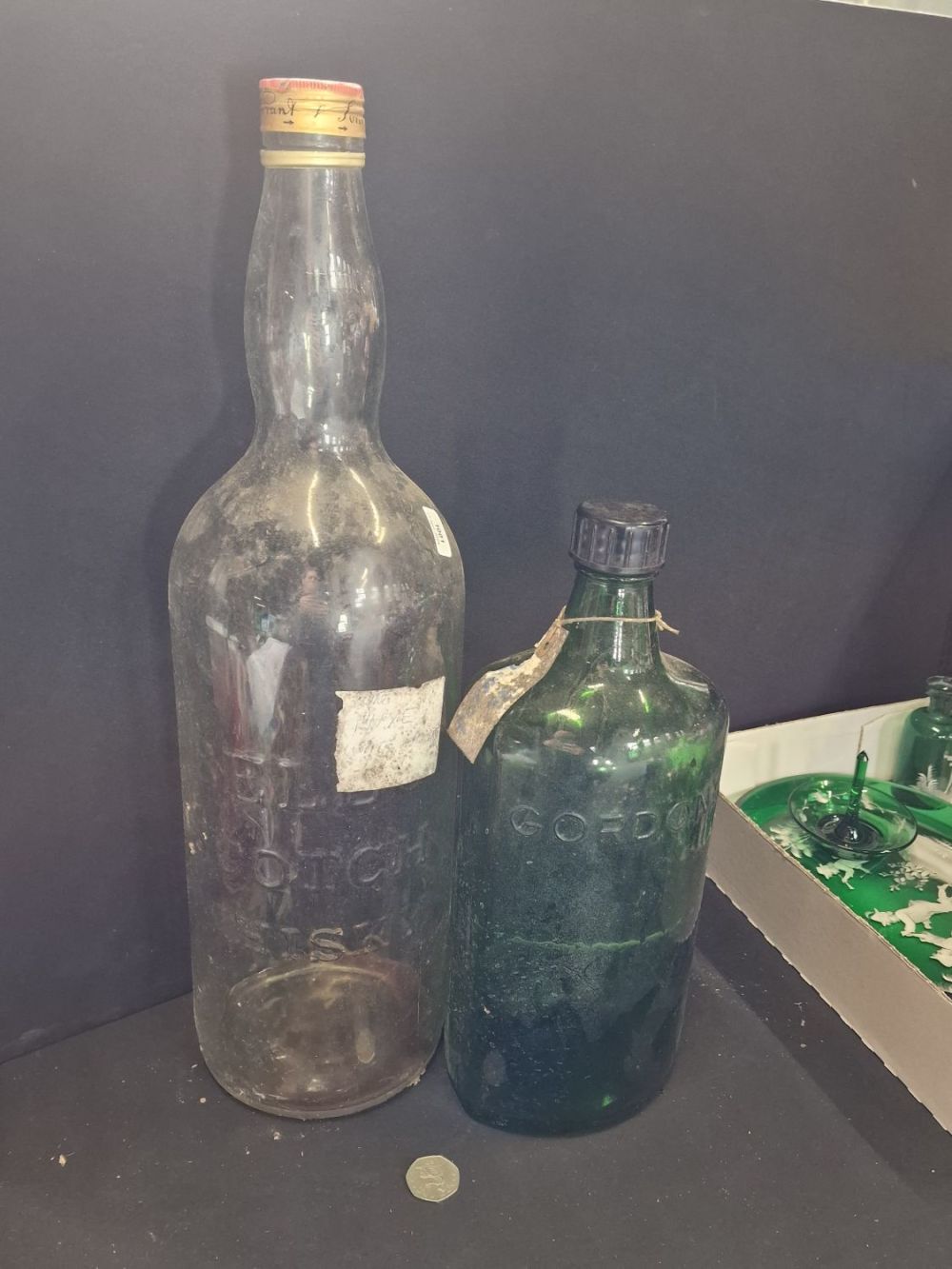 Lot 391: A vintage Scotich whiskey bottle and large Gordon's...
