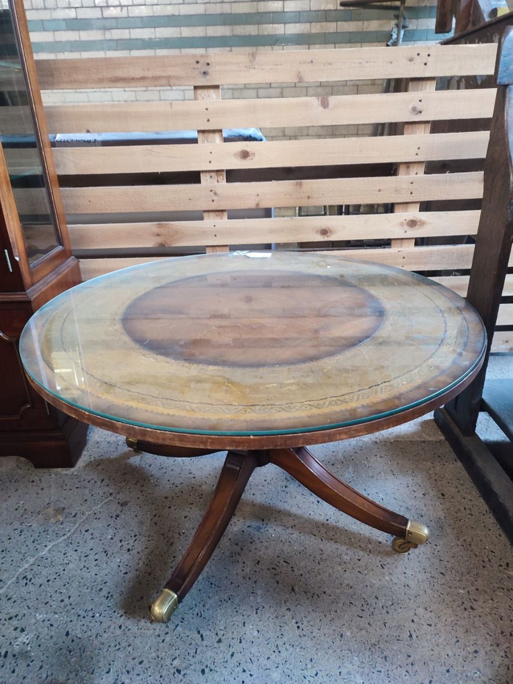 Lot 404: Glasses top Victorian coffee table on wheels
