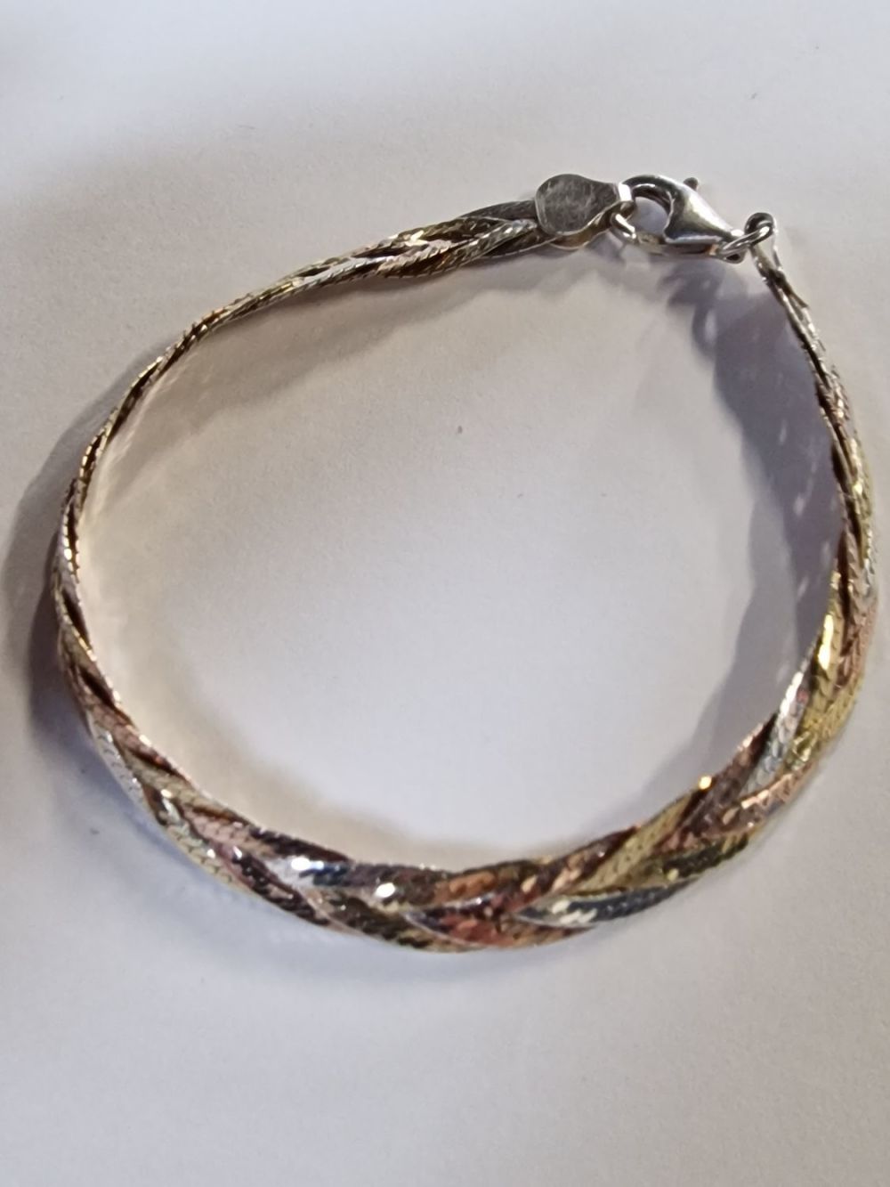 Lot 419: Sterling silver tri coloured ladies bracelet