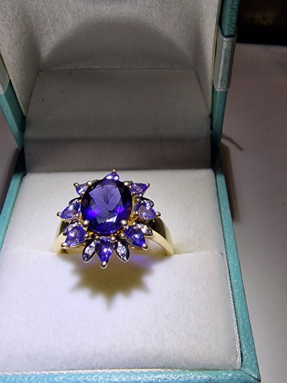 Lot 425: Purple glass floral design ring set in 9ct...