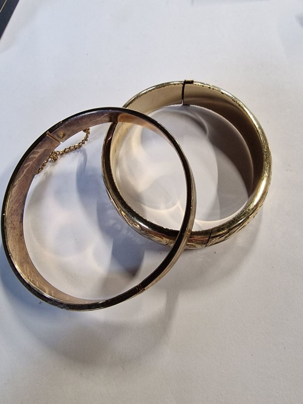 Lot 426: Two gold plated and gold filled ladies bangels