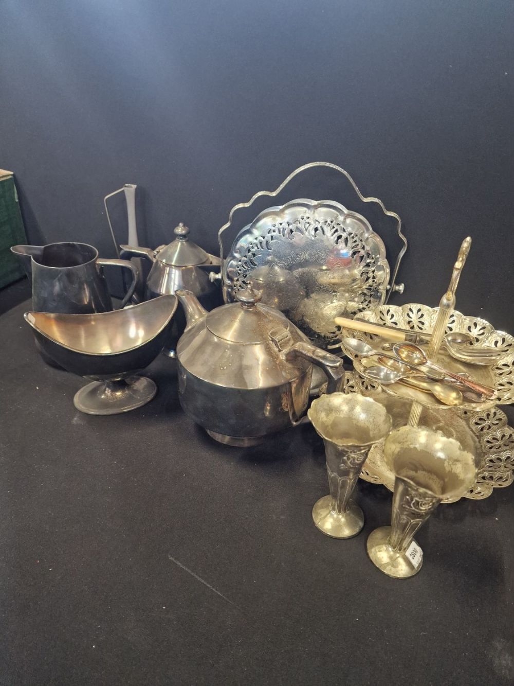 Lot 85: A collection of silver plate items.