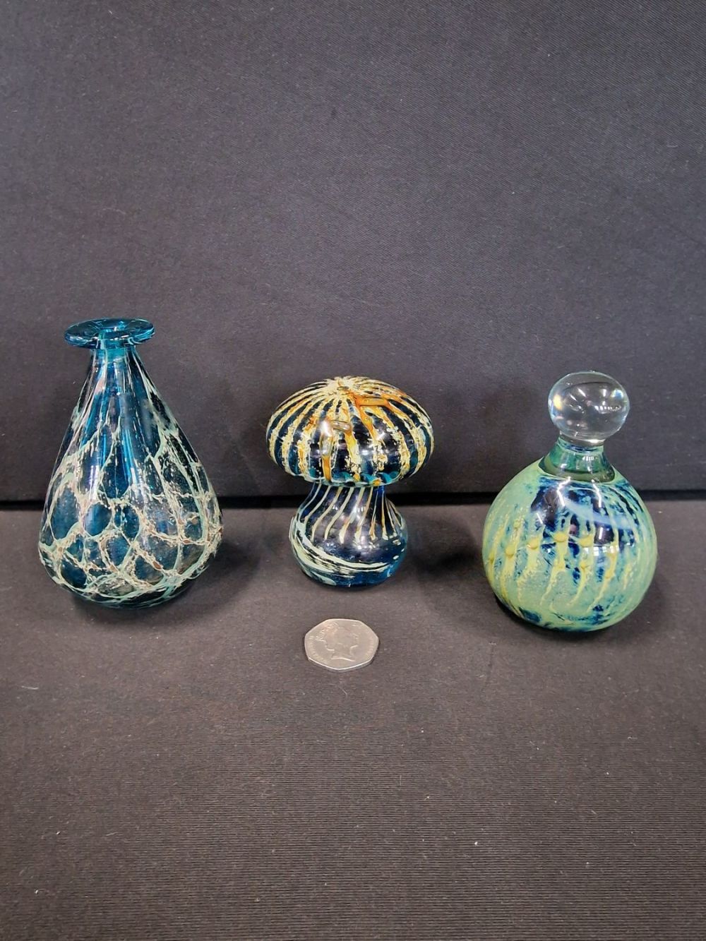 Lot 90: Three pieces of Mdina glassware, posey vase and...