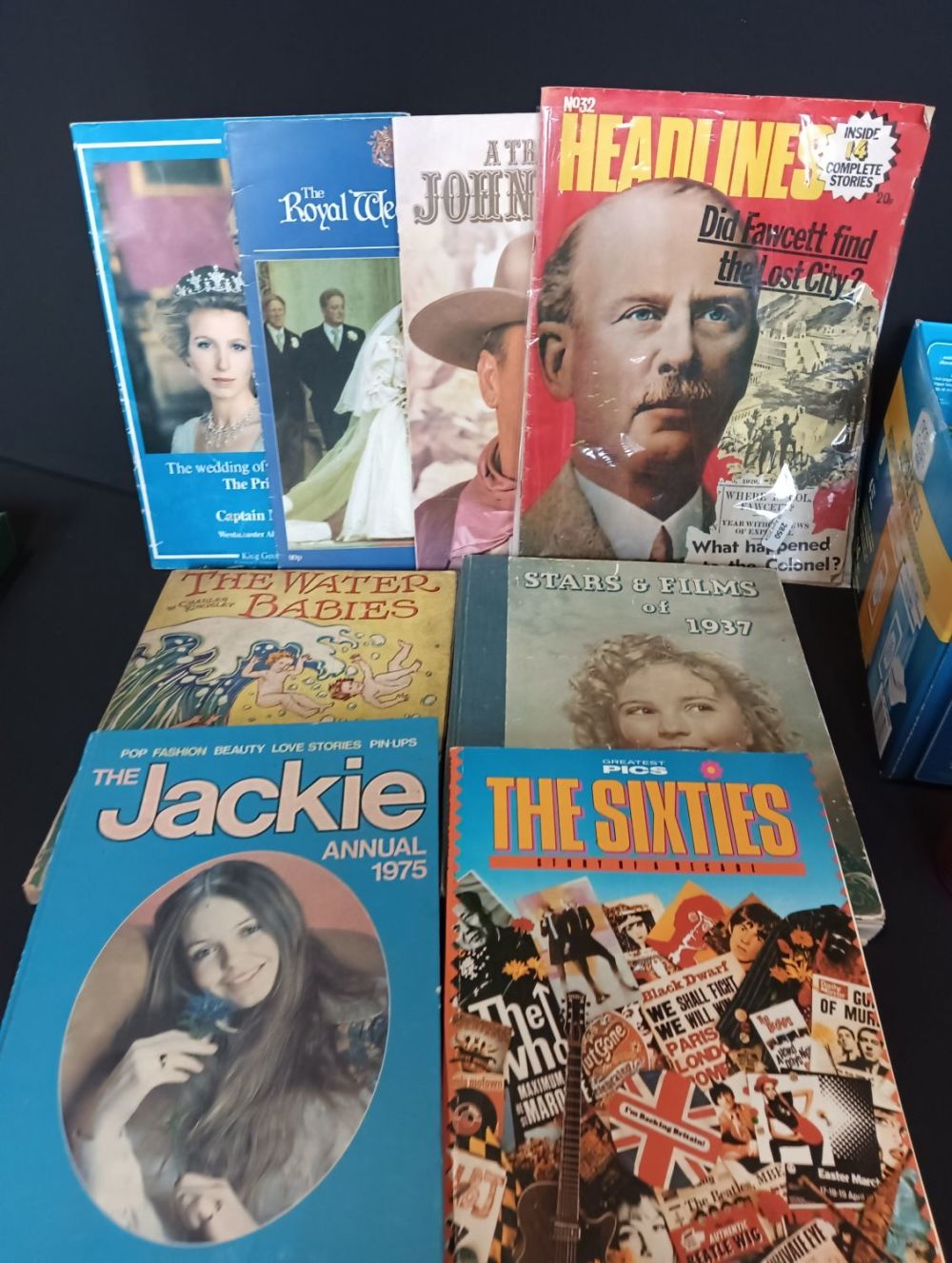Lot 163: Collection of books and magazines. Including John Wayne,the...