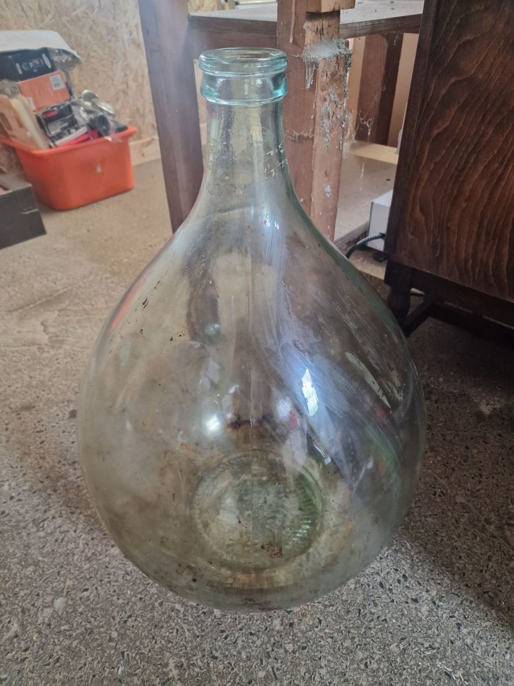 Lot 382: A very large Antique clear Glass Carby Demijohn...