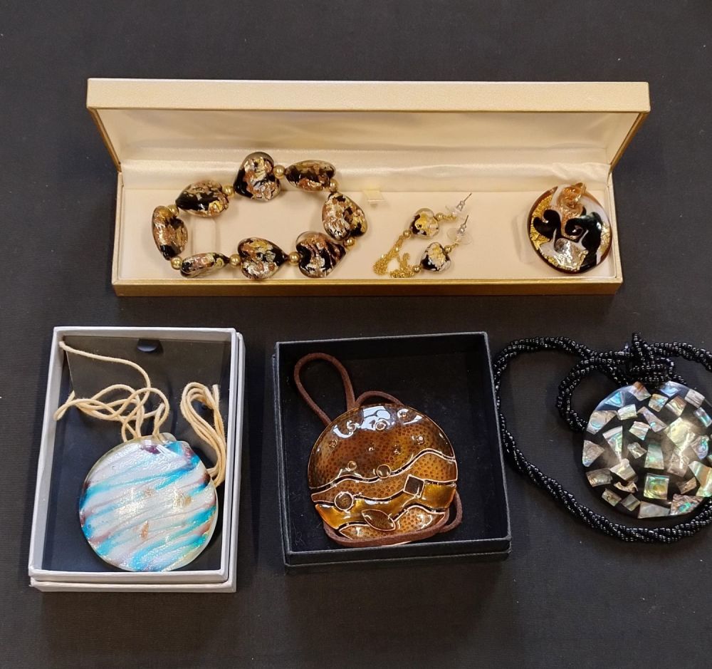 Lot 418: Murano black,gold and white swirls, glass set consisting...