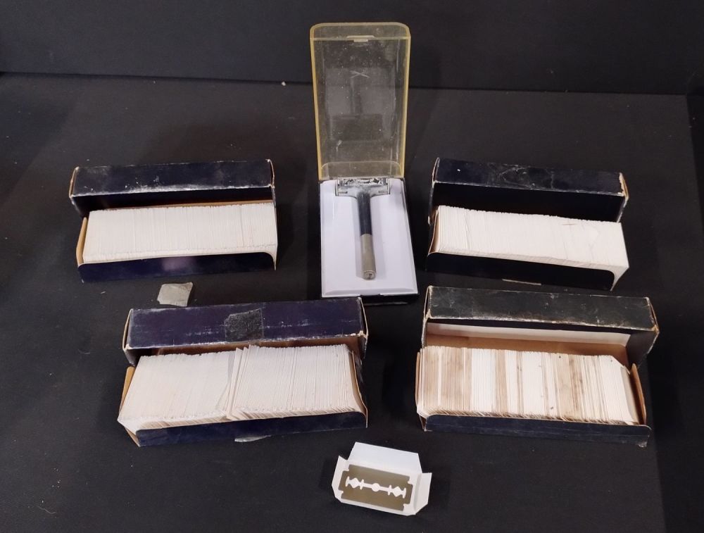 Lot 159: Traditional razor shaver with storage for blades on...