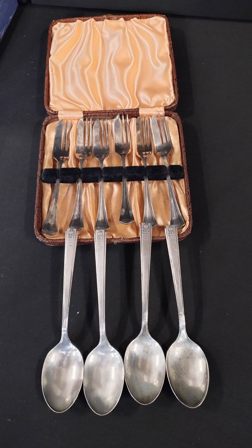 Lot 161: Selection of silver plated items including,rack, spoons, knives,...