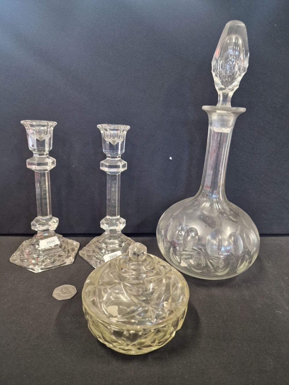 Lot 167: A selection of cut glass candle sticks, decanter...