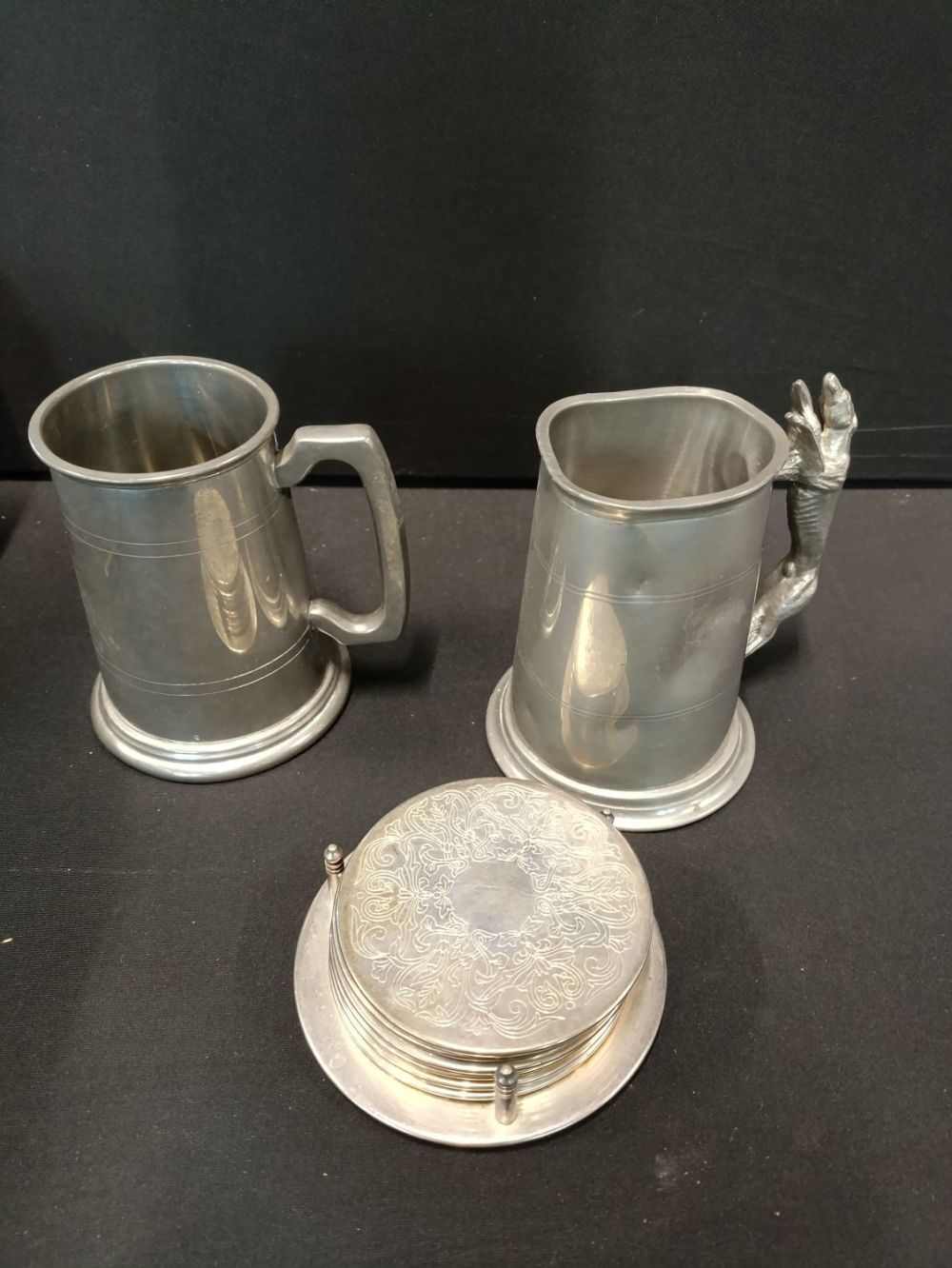 Lot 187: 2 Pewter tankards, one of which has a...