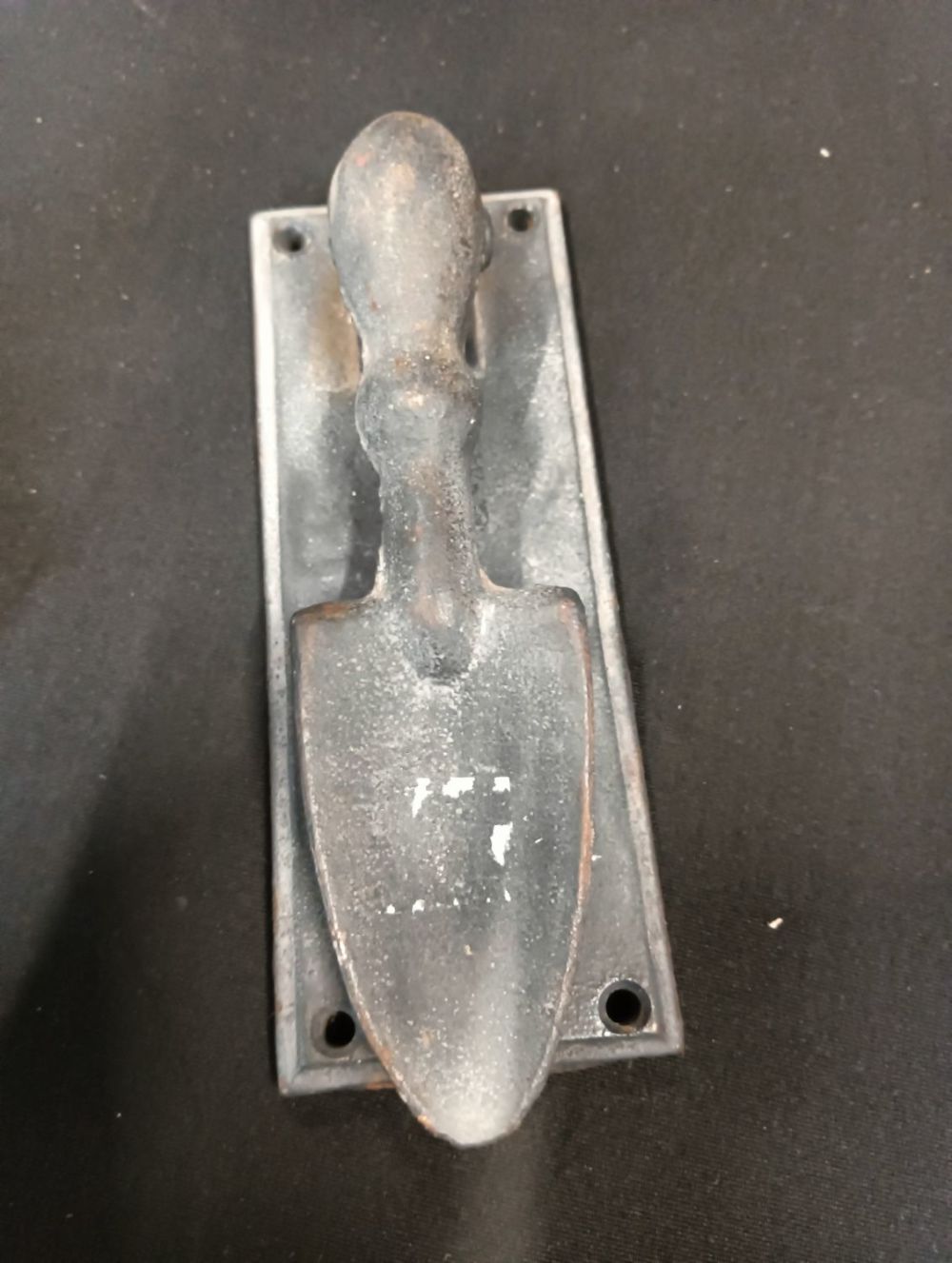 Lot 196: Cast iron Vintage trowel door knocker