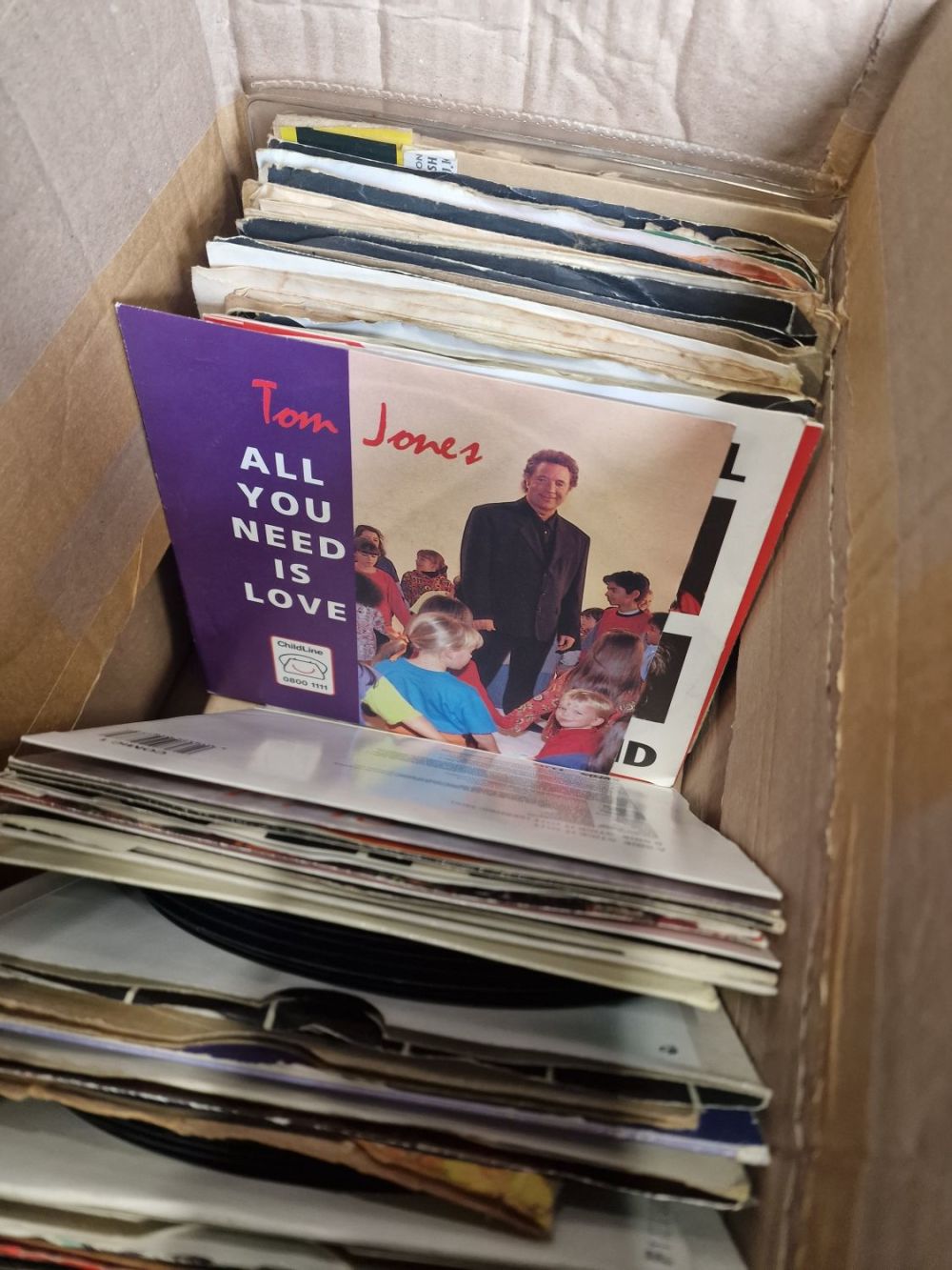 Lot 202: A selection of vinyl over 100 45s LPs....