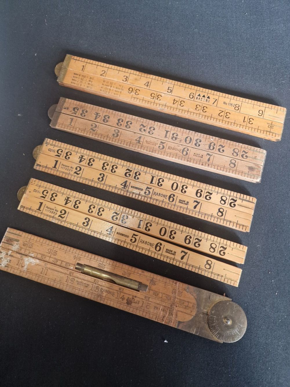 Lot 217: Five vintage RABONE wooden rulers