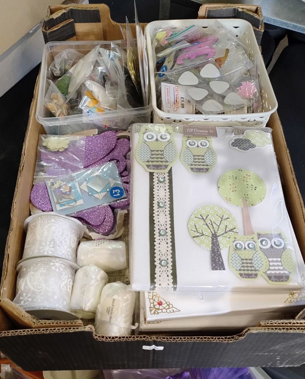 Lot 235: Selection of craft items including Ribbon, glitter butterflies,...