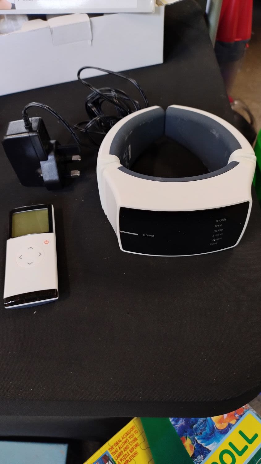 Lot 244: Neostar Health multi-Function Neck Massager with remote and...