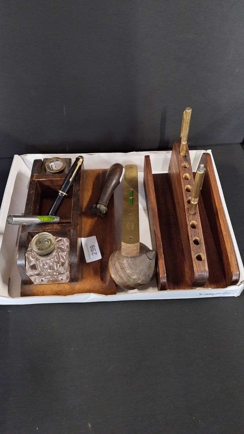 Lot 259: Selection of vintage wooden desk items including wooden...