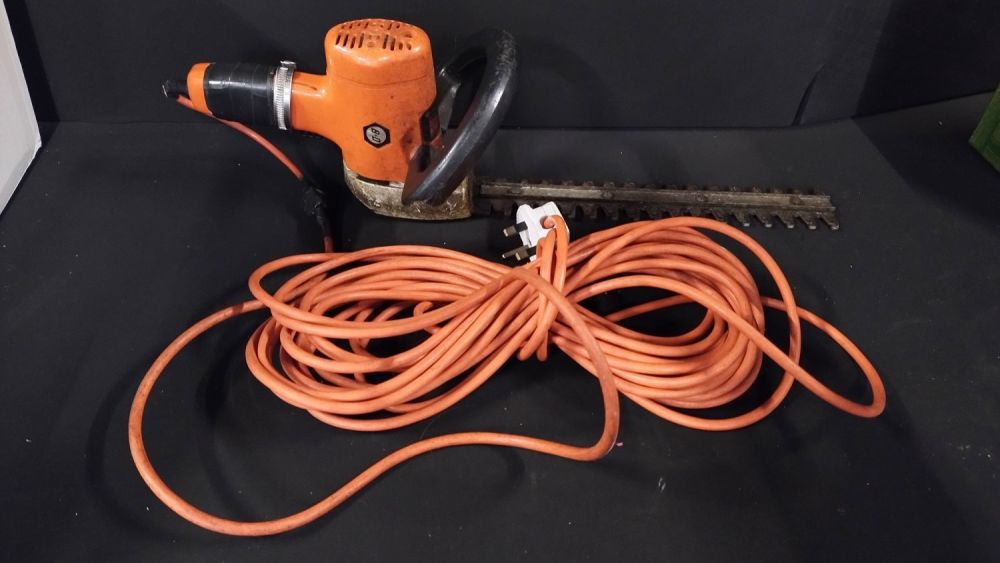 Lot 279: Black and decker hedge trimmer with 12 inch...