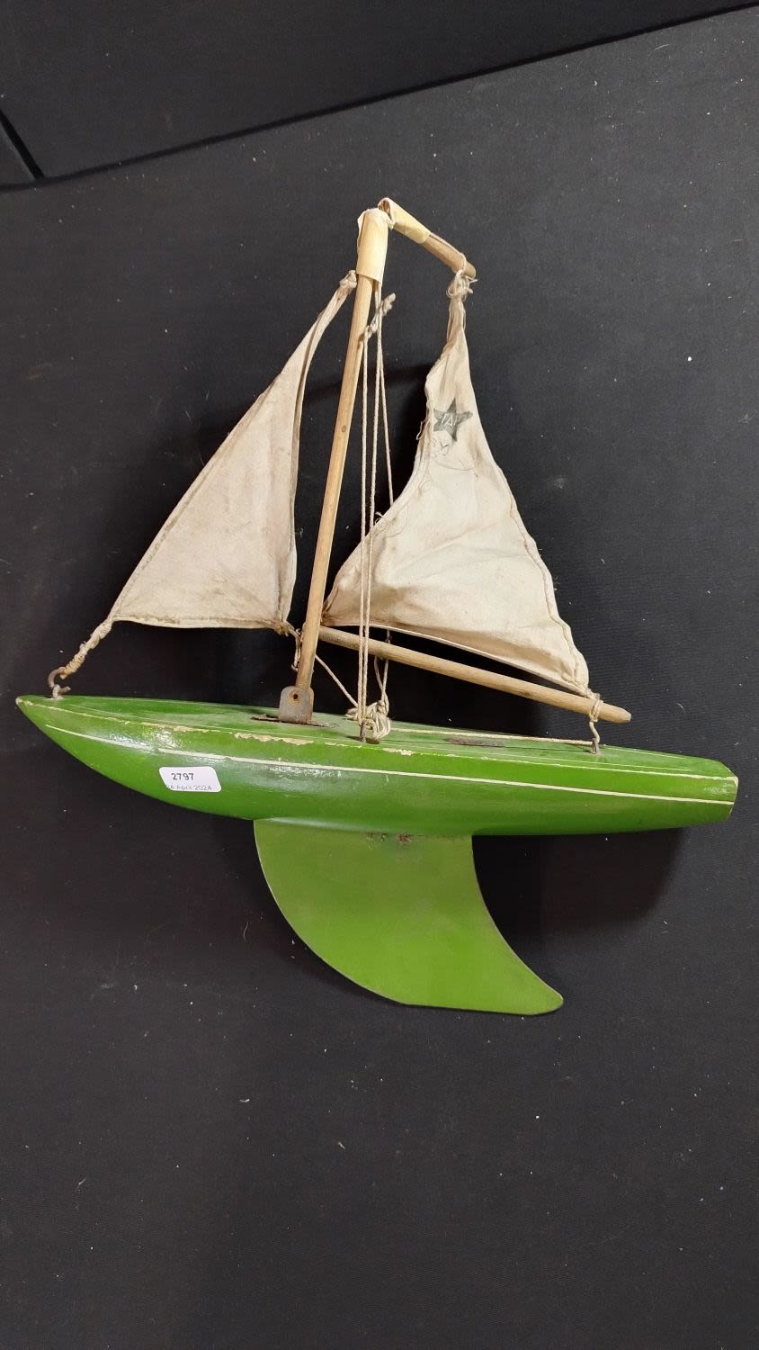 Lot 297: Star Yacht, Green Wooden sail boat with 2...