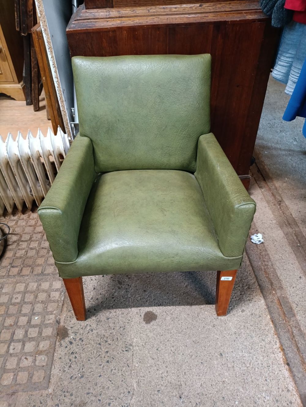 Lot 312: Vintage green leather Childs arm chair