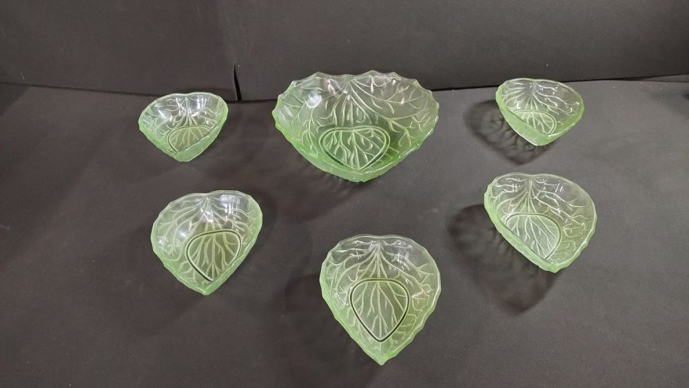 Lot 318: Beautiful glass green patterned bowl and five dishes...