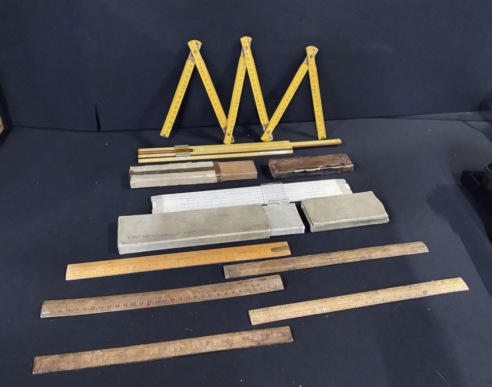 Lot 326: Various vintage items including wooden rulers, slide rulers,
