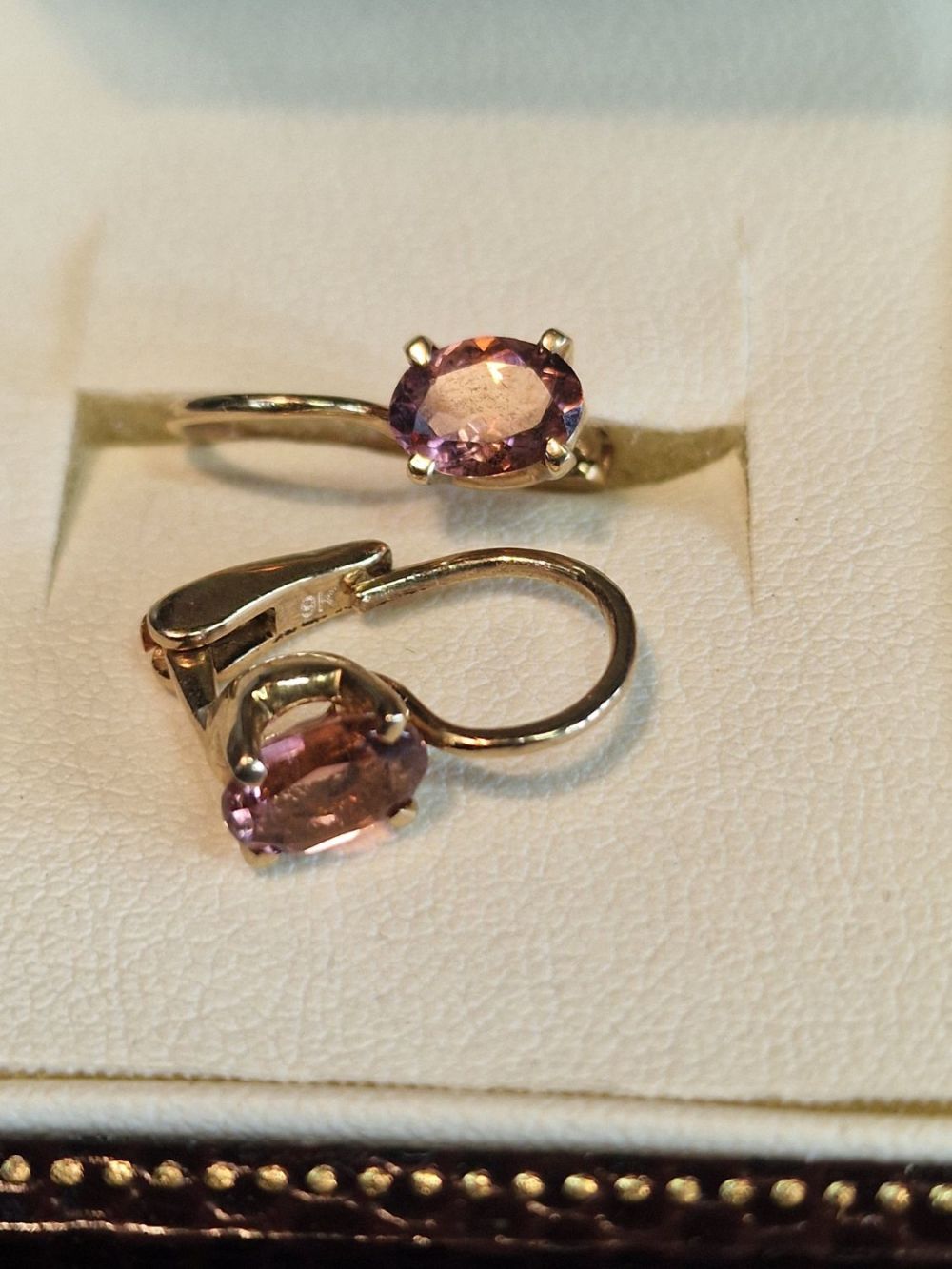 Lot 336: 9 carat gold and pink cubic zirconia set...