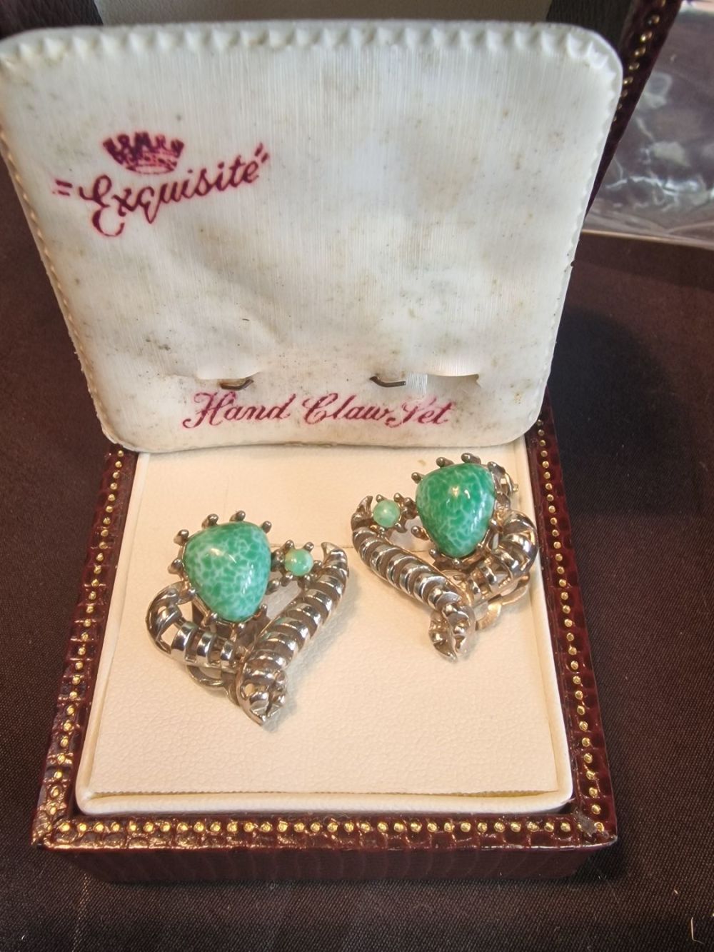 Lot 337: Pair of clip on earrings set with green...