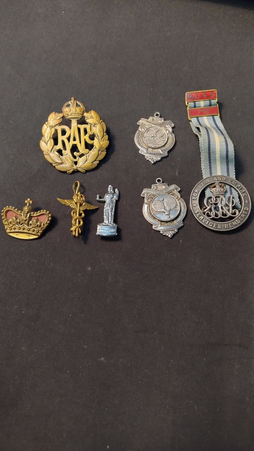 Lot 341: Cap badges, two tennis medals one has inscription...