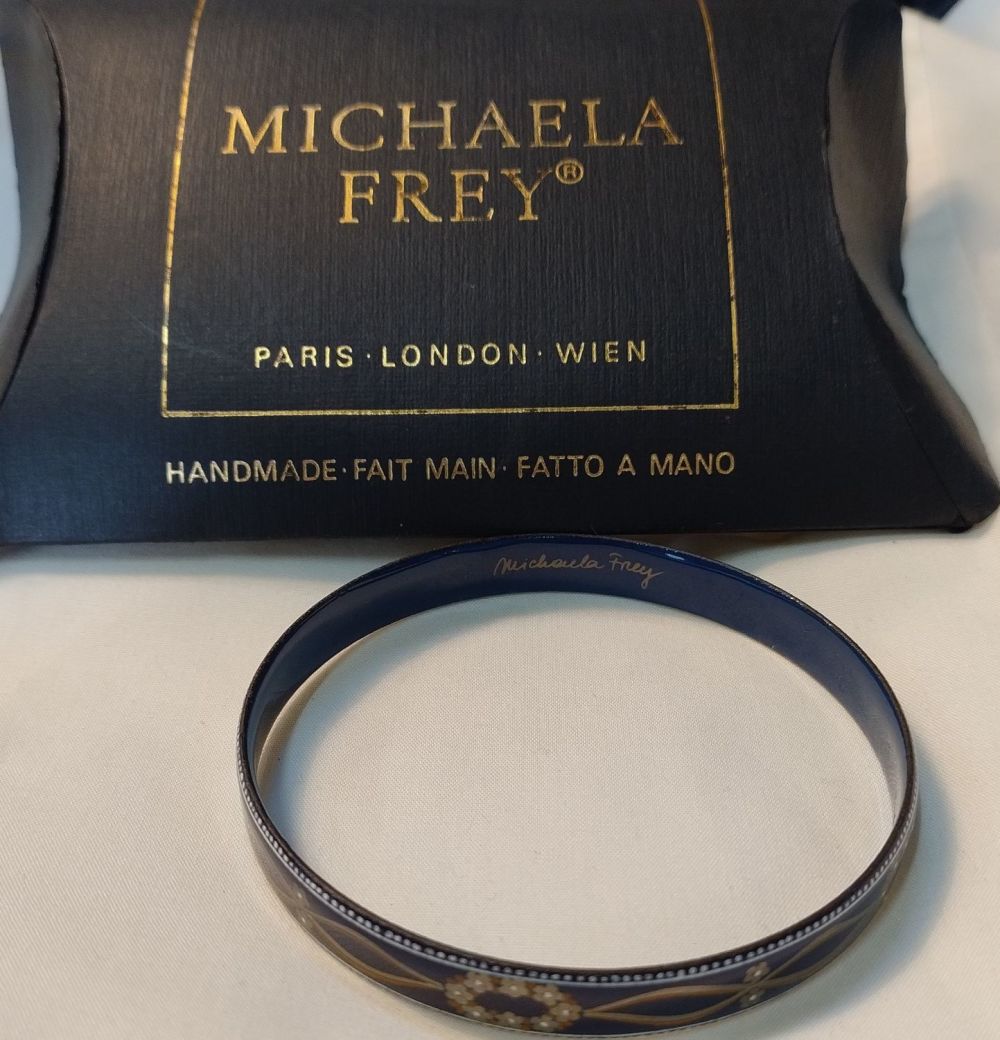 Lot 355: MICHAELA FREY, enamelled skinny bangle, with blue enamelling...