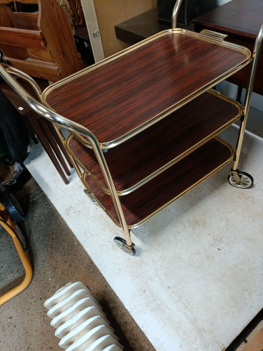 Lot 359: Vintage 3 tier serving trolley with dark wood...