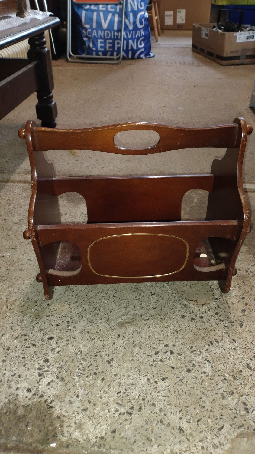 Lot 379: Vintage Dark wood magazine rack with gold trim...