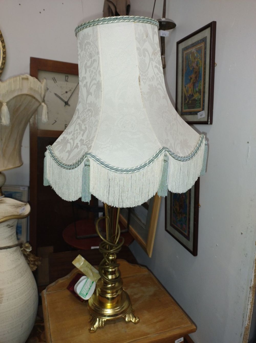 Lot 381: Vintage gold coloured three leg table lamp with...