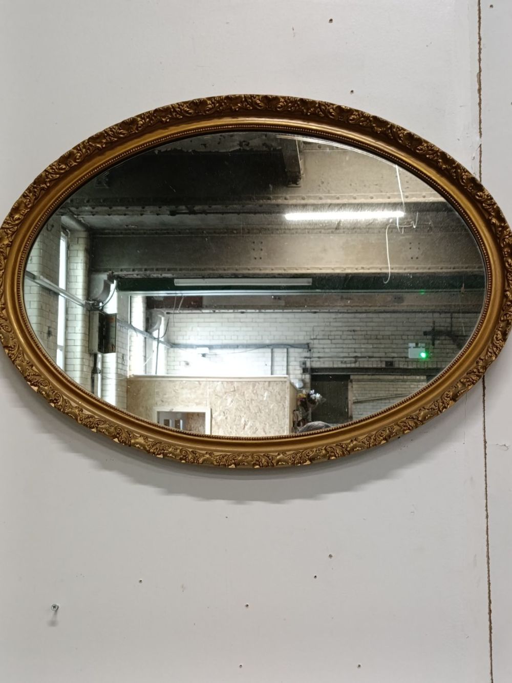 Lot 390: Large vintage gilt framed oval mirror in great...