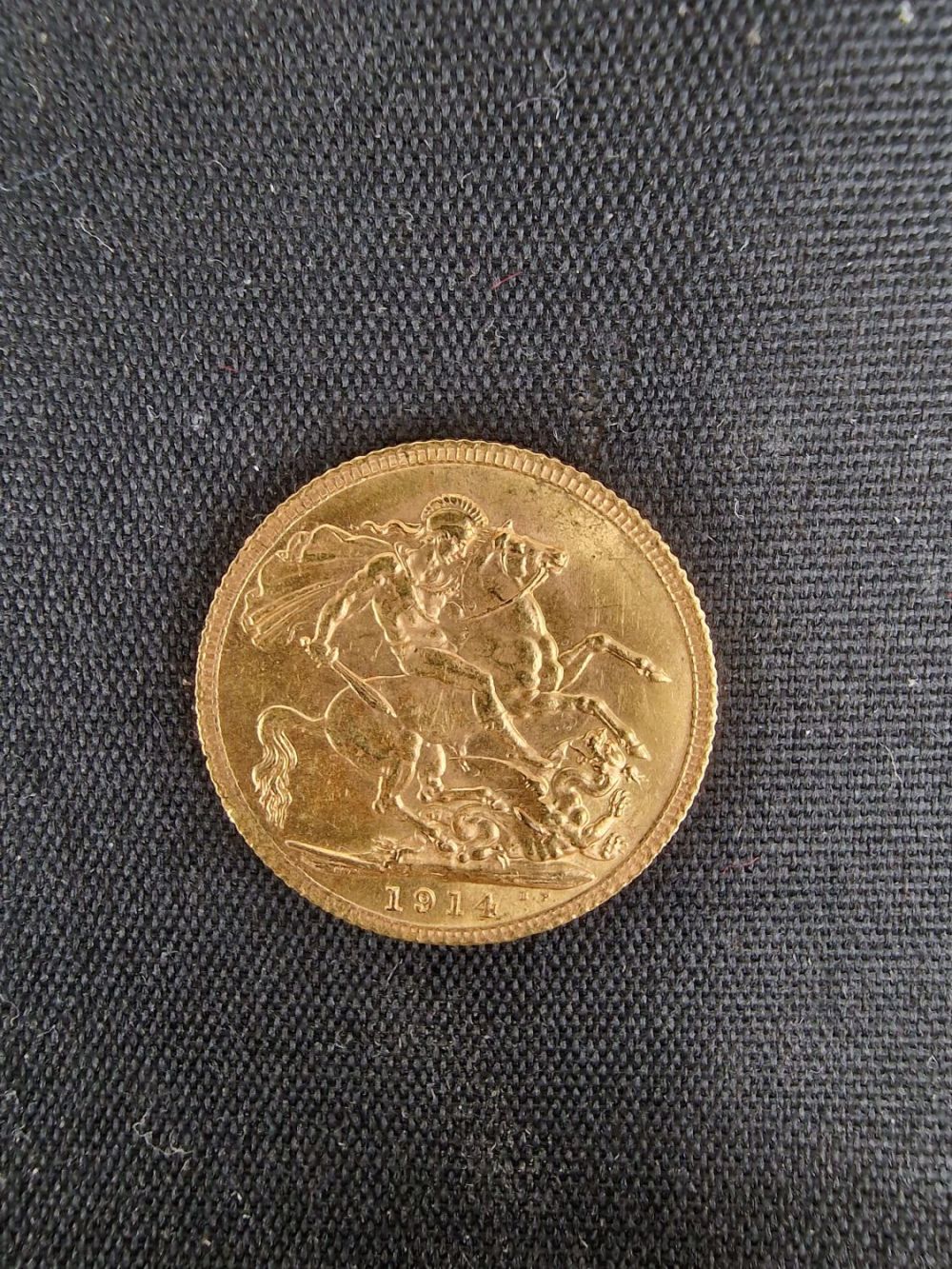 Lot 413: 1914 King George V 22ct Gold Full Sovereign...