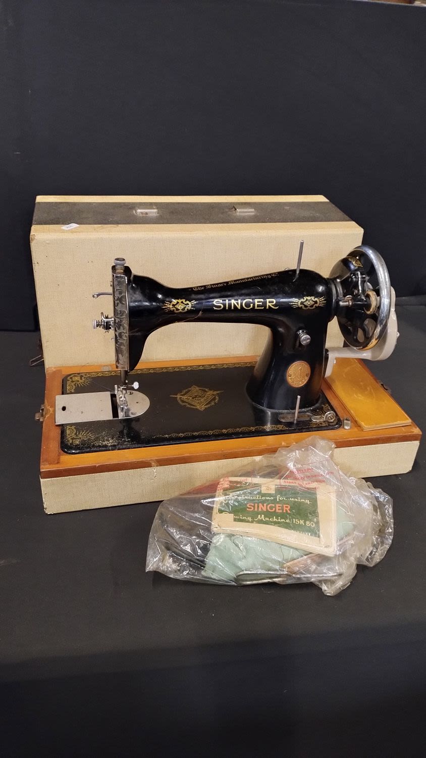 Lot 432: Vintage singer sewing machine, with original cover hand...