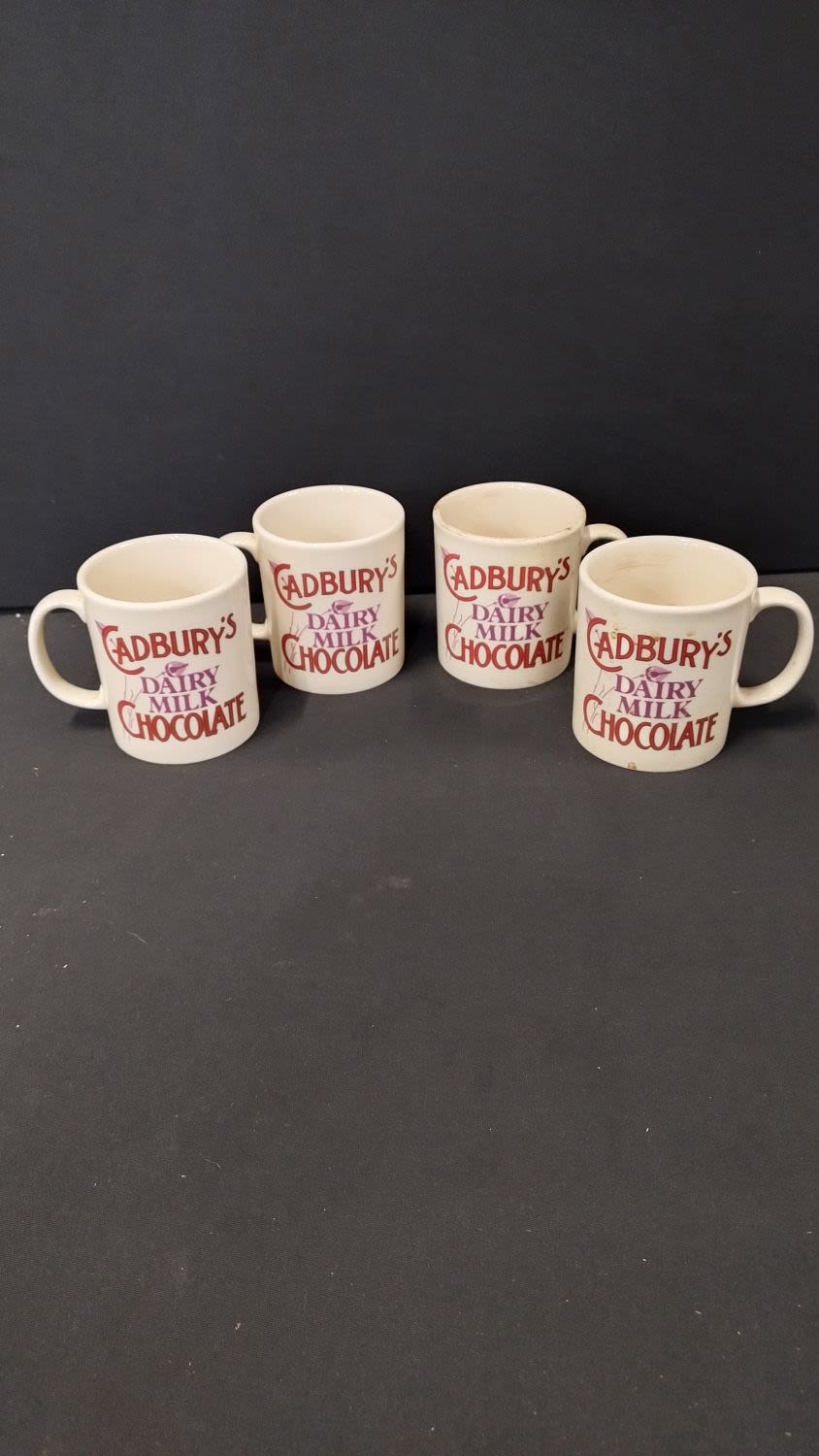 Lot 436: Four vintage Staffordshire Cadbury's Dairy Milk hot chocolate...