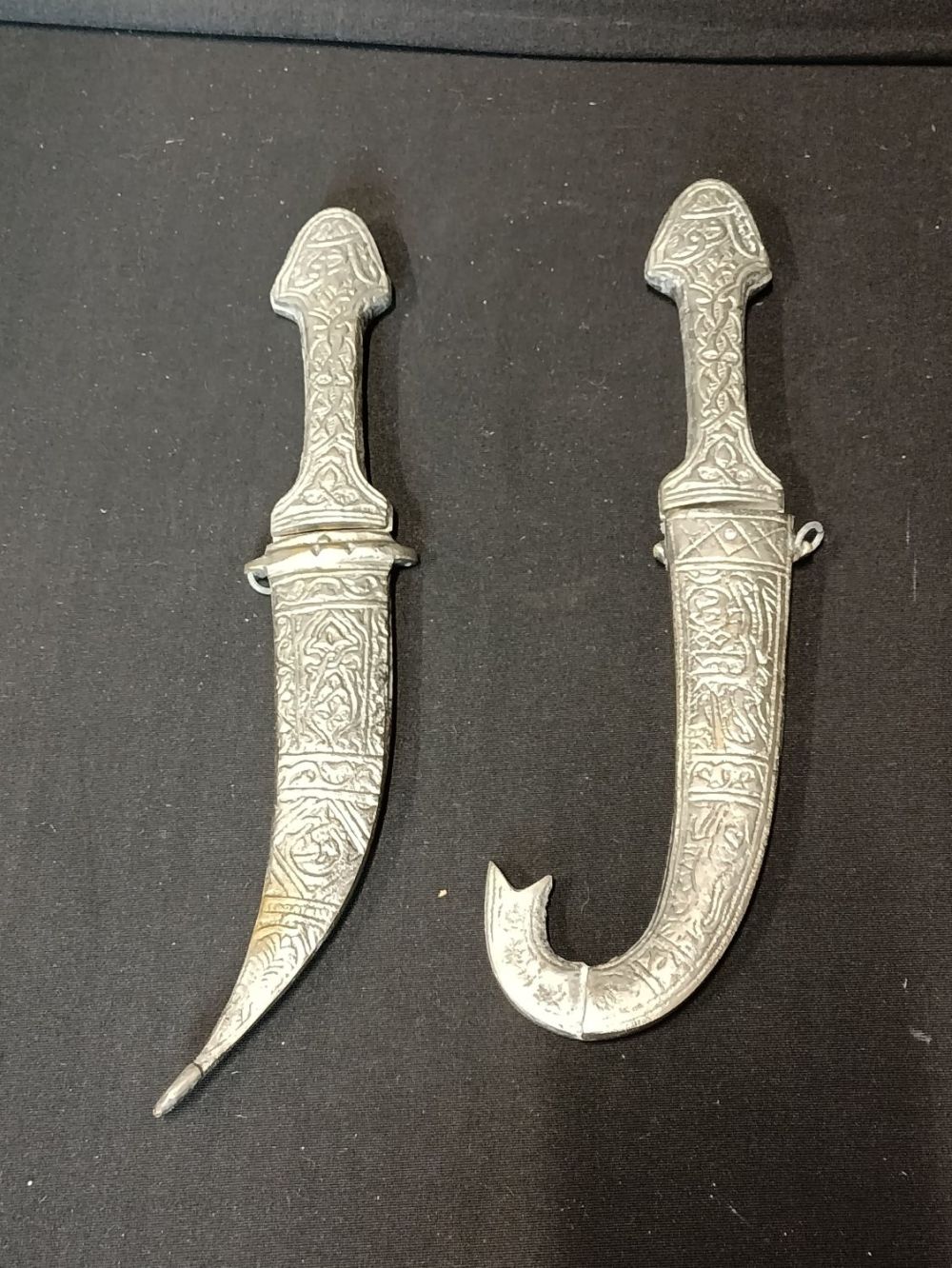 Lot 455: 2 ceremonial middle eastern silver plated daggers in...
