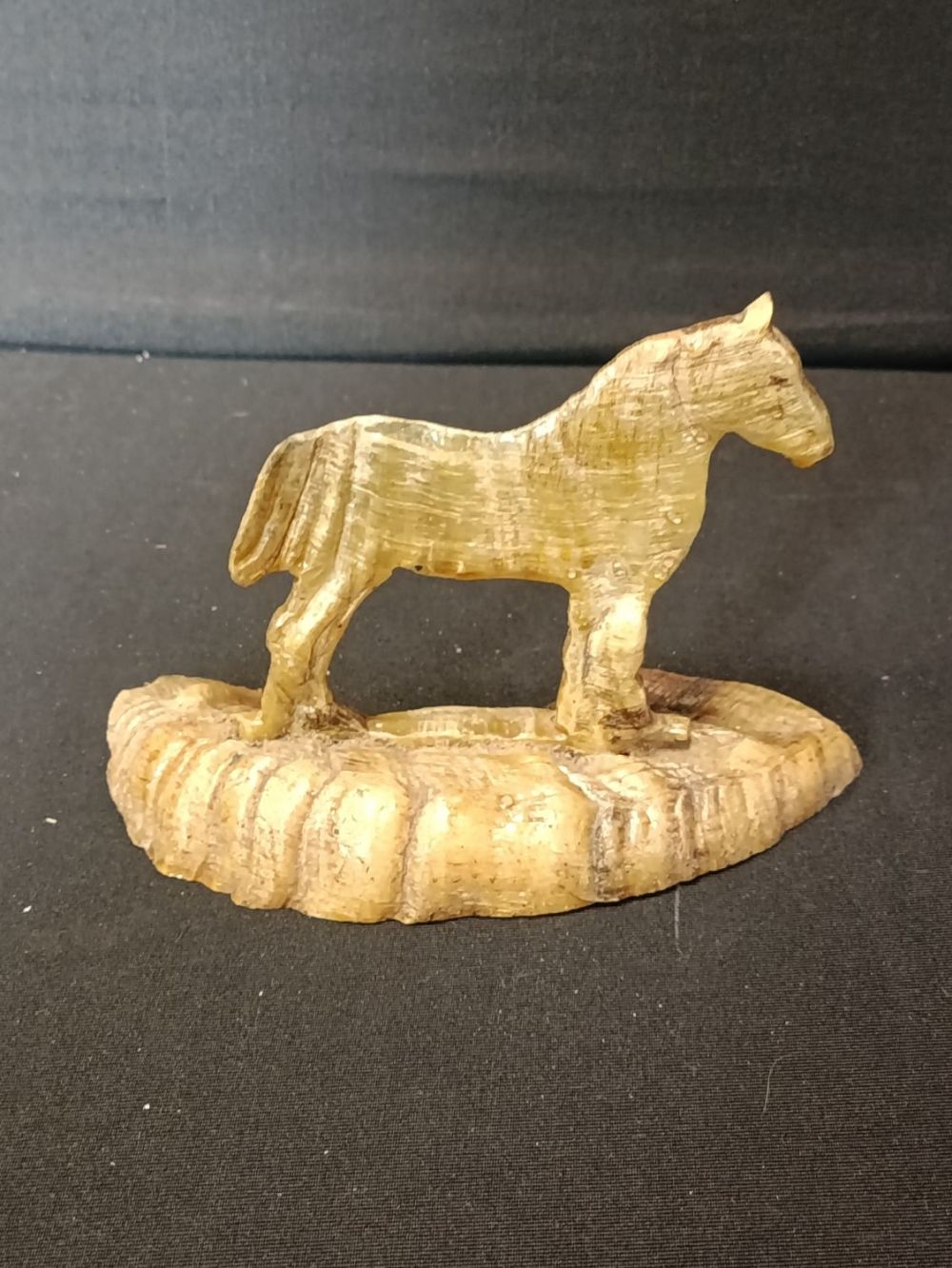 Lot 471: Varnished Horse sculpture from Rams Horn and sinu.