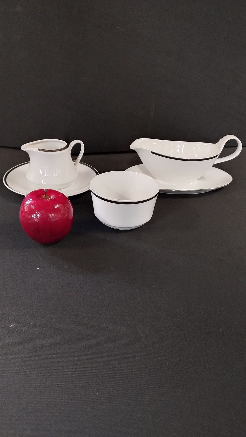 Lot 269: Bohemia porcelain,Gravy boat, sugar bowl, milk jug and...