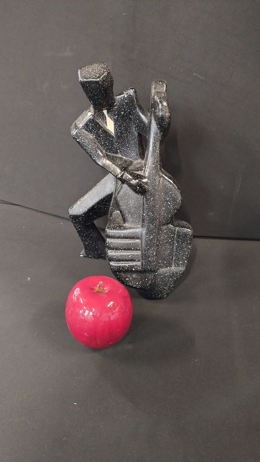 Lot 270: Modern figure of a man playing the big...