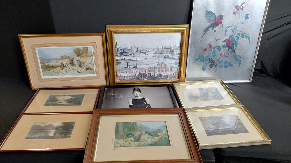 Lot 392: Box of framed pictures, Audrey Hepburn, Peacock of...