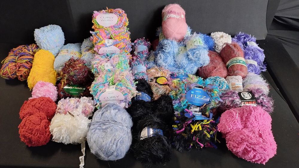 Lot 402: Box of various coloured wool Ideal for crochet