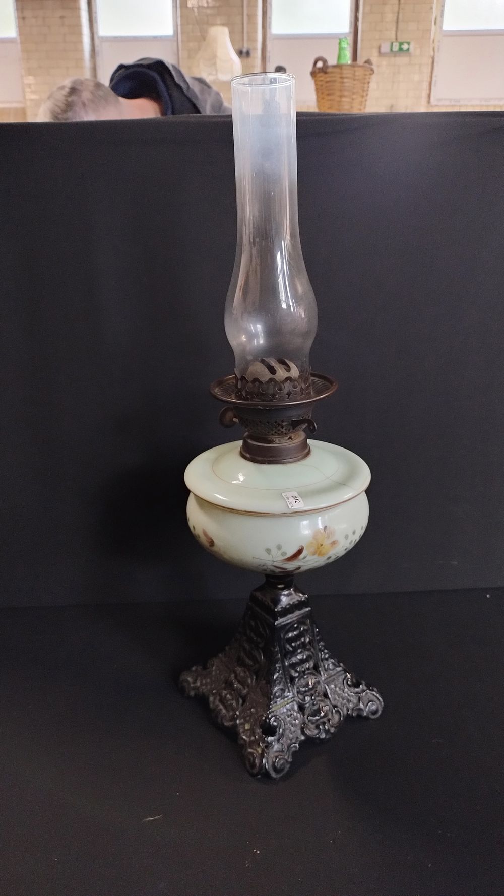 Lot 405: Vintage paraffin lamp with floral design on black...