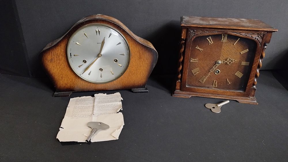 Lot 407: Two vintage wooden mantel clocks with keys, one...